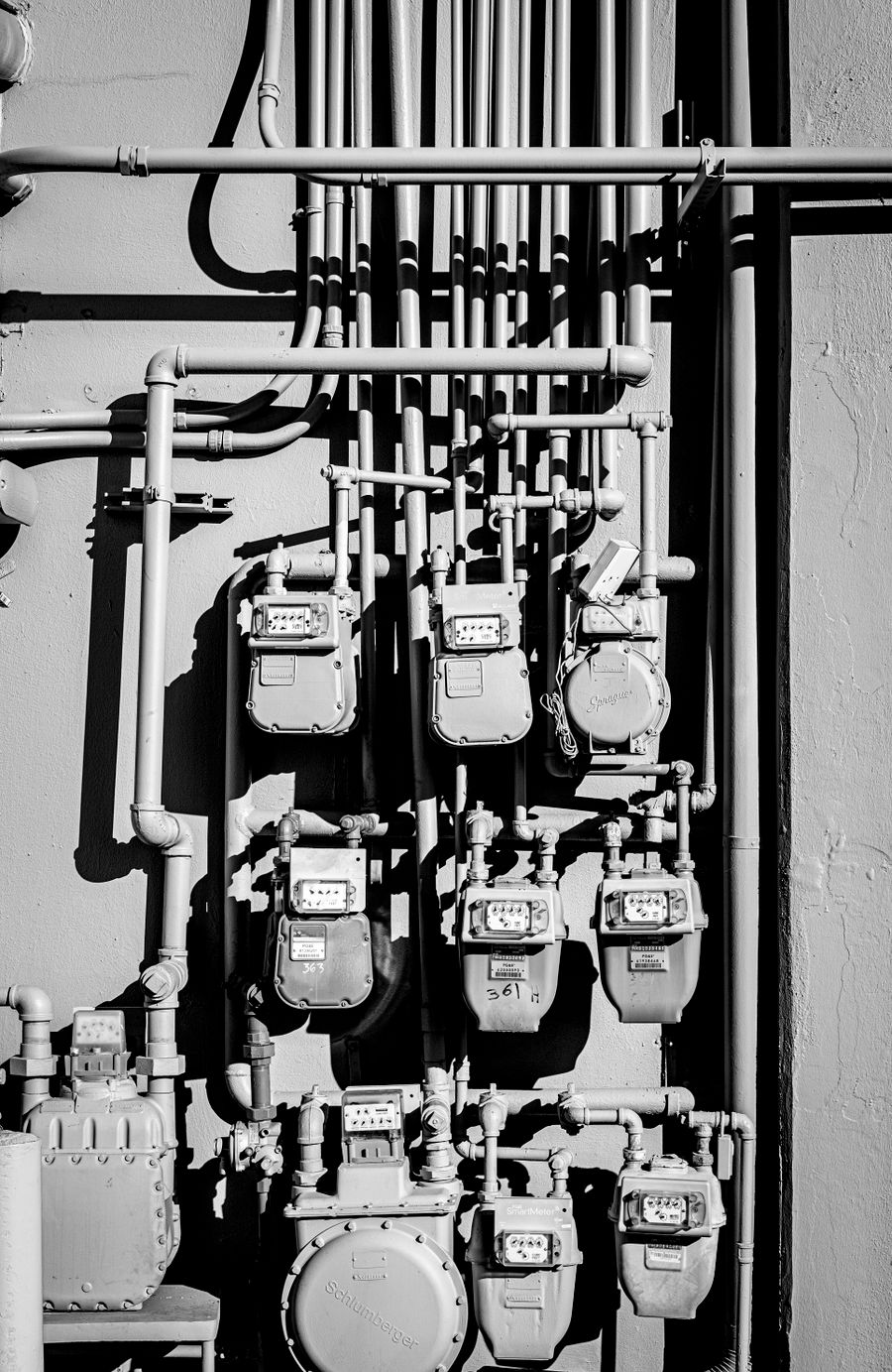 Gas meters mounted on an exterior wall in Prescott, AZ
