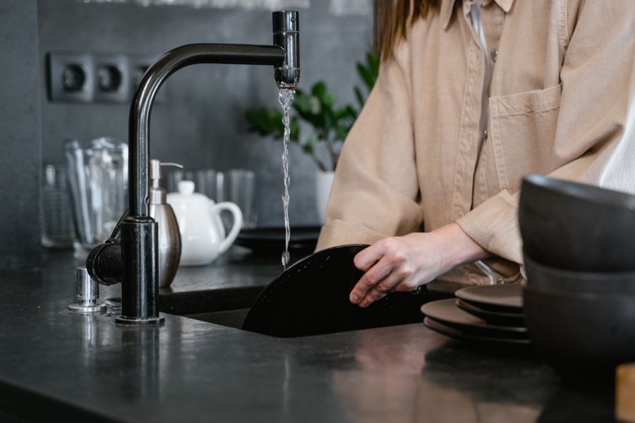 Kitchen sink faucet with running water in Prescott, AZ
