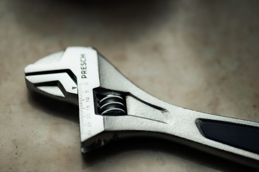 Close-up of an adjustable pipe wrench used by Prescott plumbers
