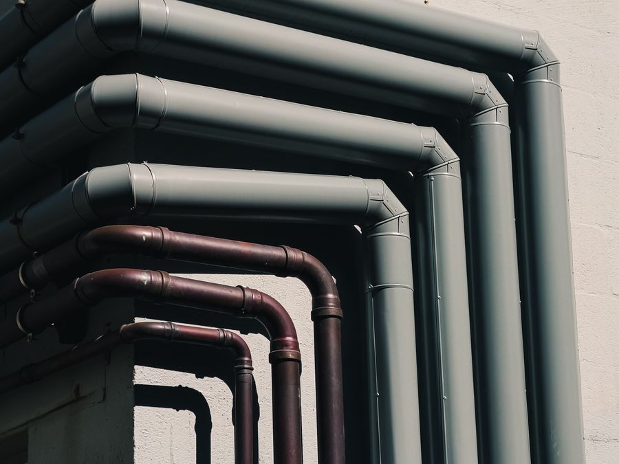 Exposed water supply pipes on a building in Prescott, AZ